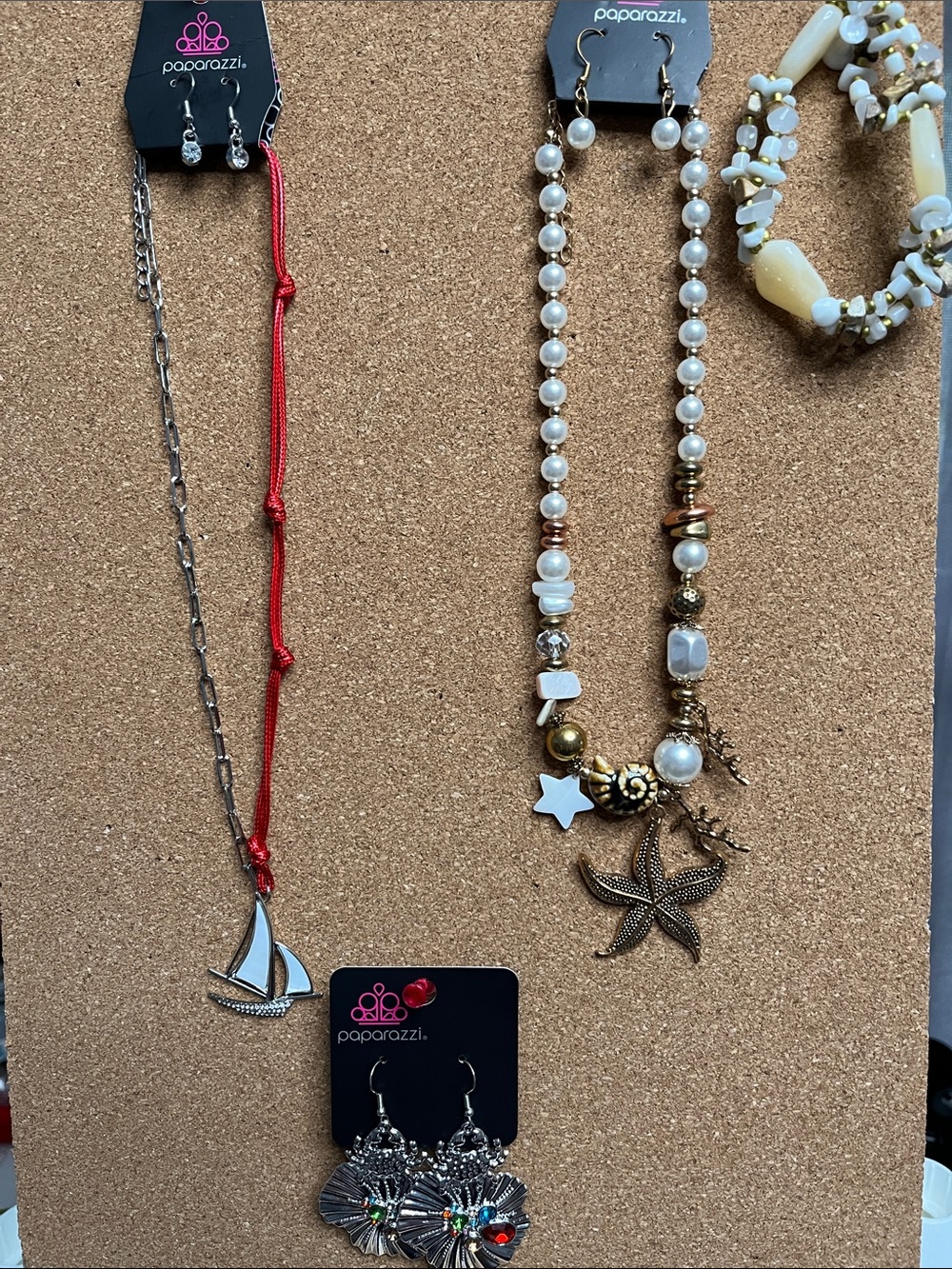 paparazzi Summer themed jewelry. White Pearl & Gold Starfish Long Necklace